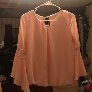 Soft pink blouse with lace on sleeve
